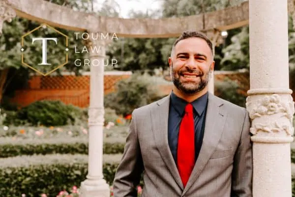 DUI attorney, Adam Touma, standing outside